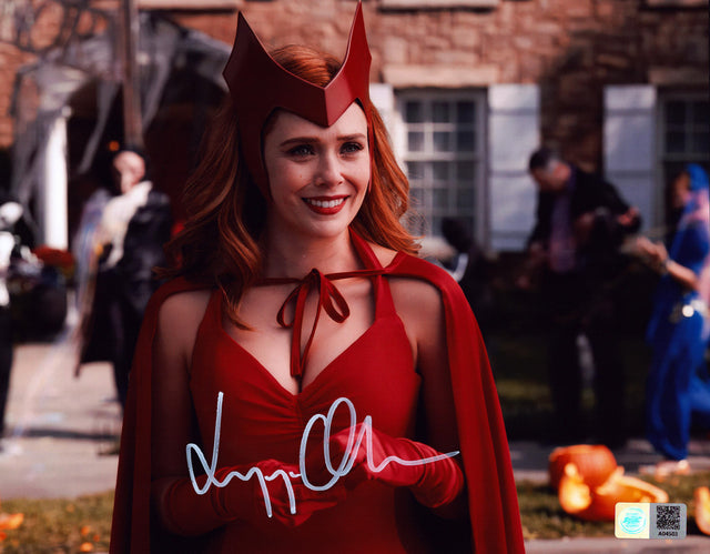 A signed Elizabeth Olsen Signed - Photos - 8x10 — B - 8x10 Photo