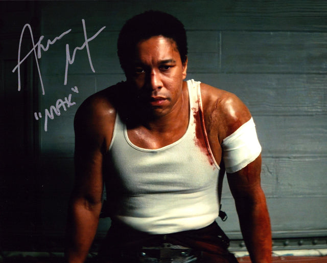 A signed Aaron Moten Signed - Photos - 8x10 — A - 8x10 Photo with Character Name