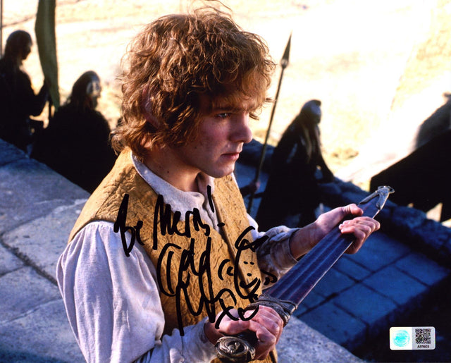 A signed Dominic Monaghan Signed - Photos - 8x10 — C - 8x10 Photo with Character Name