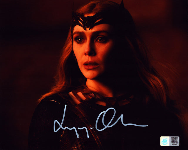 A signed Elizabeth Olsen Signed - Photos - 8x10 — A - 8x10 Photo