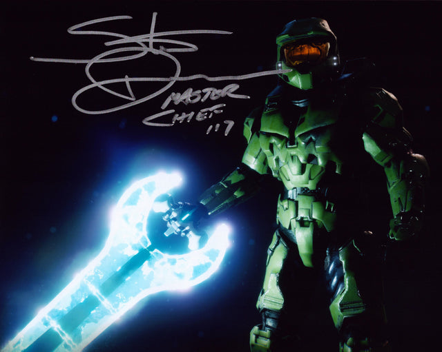 A signed Steve Downes Signed - Photos - 8x10 — C - 8x10 Photo with Character Name