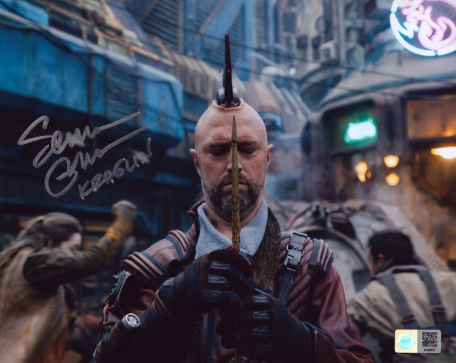 A signed Sean Gunn Signed - Photos - 8x10 — A - 8x10 Photo with Character Name