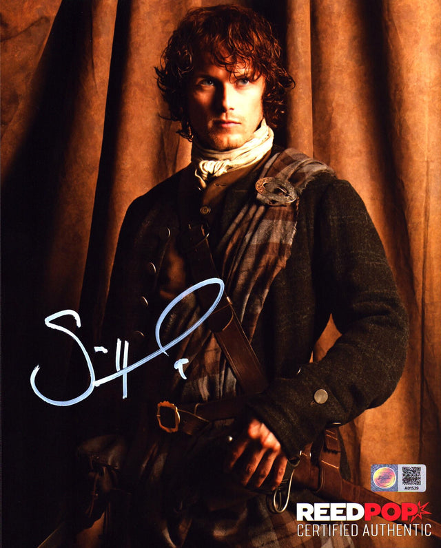 A signed Sam Heughan Signed - Photos - 8x10 — A  - 8x10 Photo