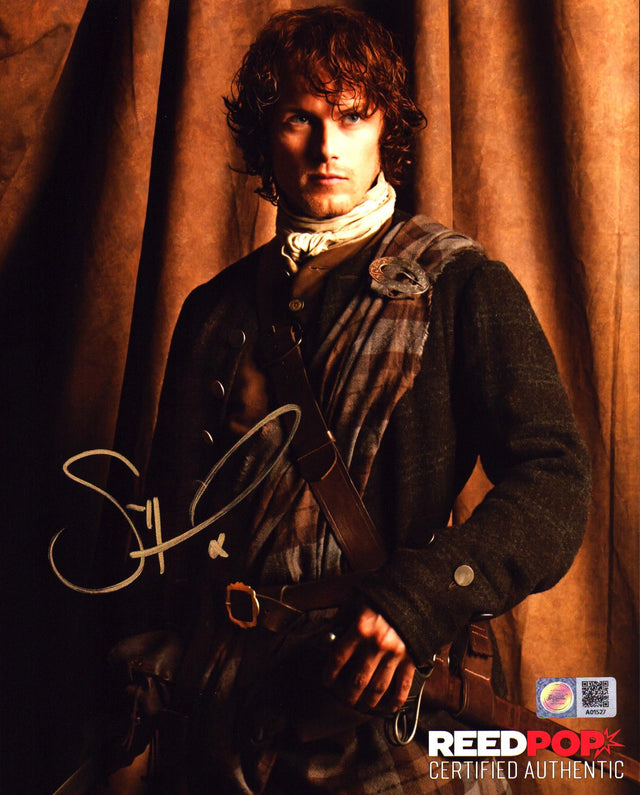 A signed Sam Heughan Signed - Photos - 8x10 — C  - 8x10 Photo