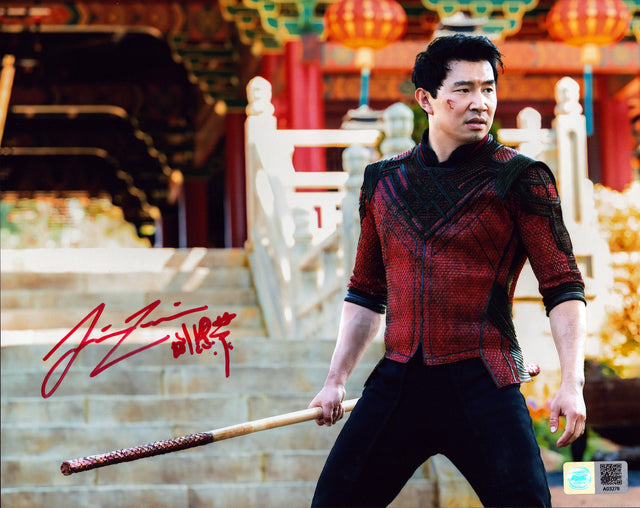 A signed Simu Liu Signed - Photos - 8x10 — A - 8x10 Photo