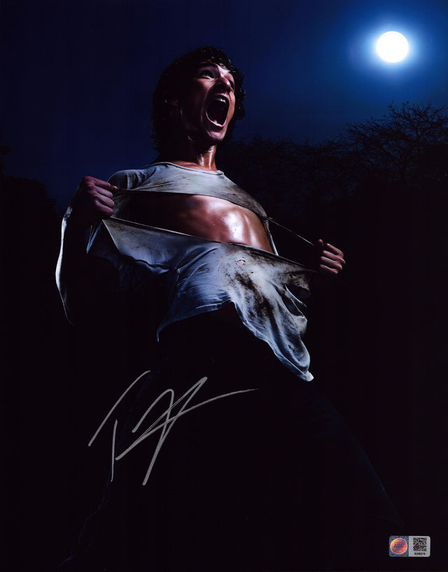 A signed Tyler Posey Signed - Photos - 11x14 — A - 11x14 Photo