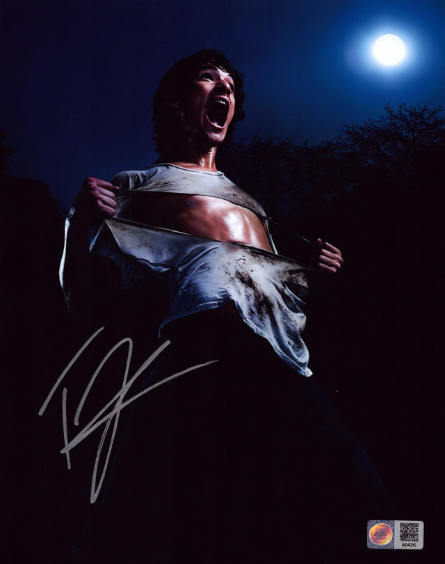 A signed Tyler Posey Signed - Photos - 8x10 — B - 8x10 Photo
